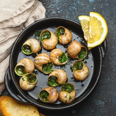 Escargots beurre ail et fines herbes image